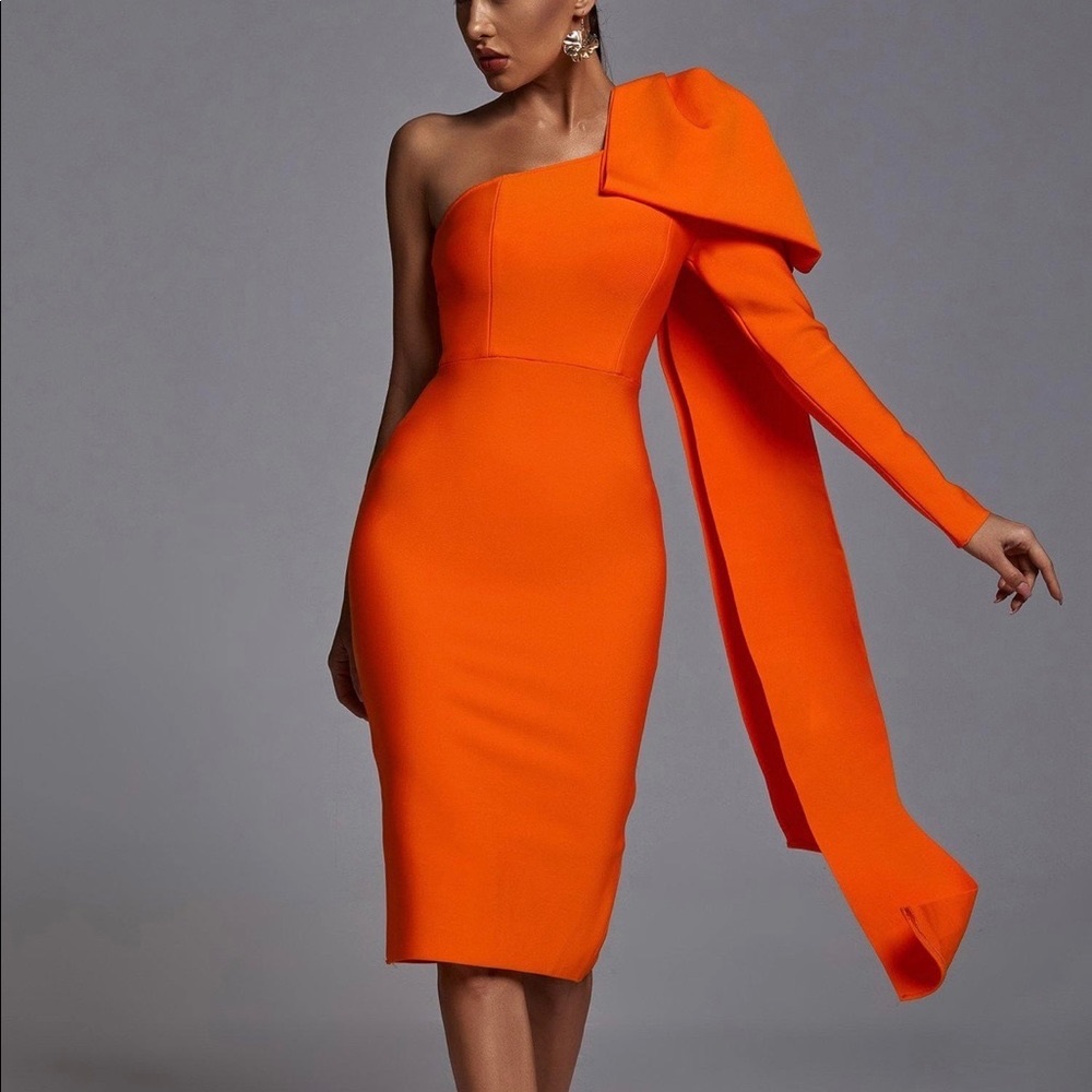 Beautiful bright Orange bodycon midi dress. Very tight fitting. Wore just once.